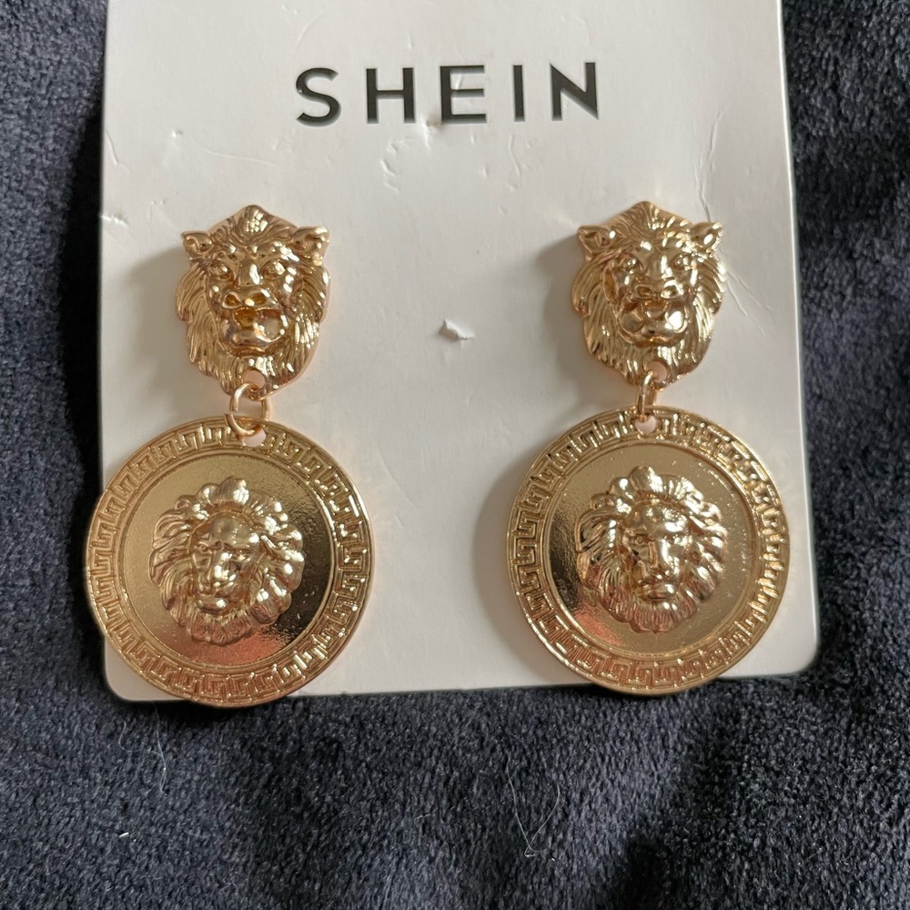 Gold lion earrings
